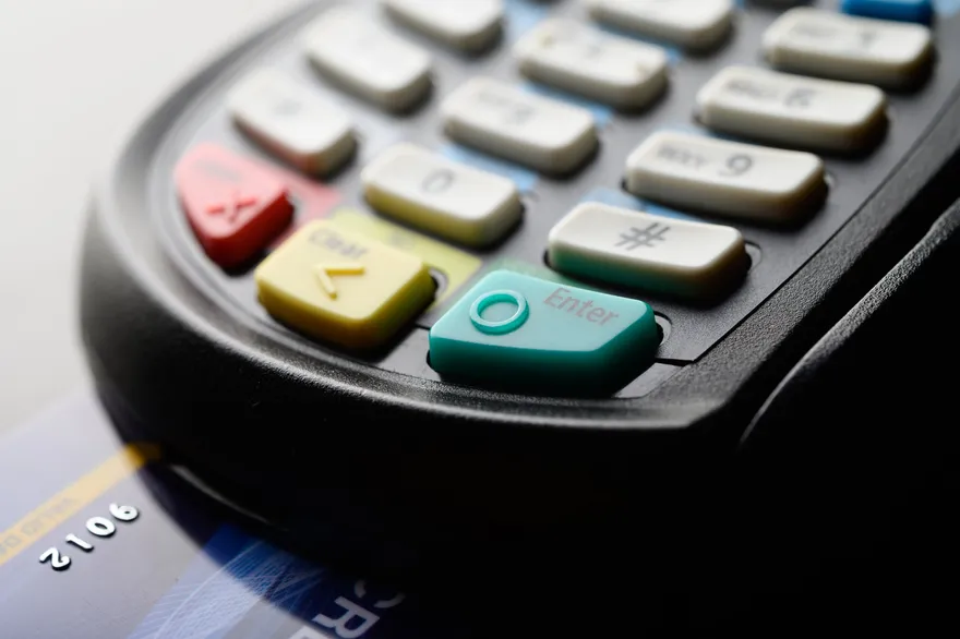 Business credit card at a payment terminal